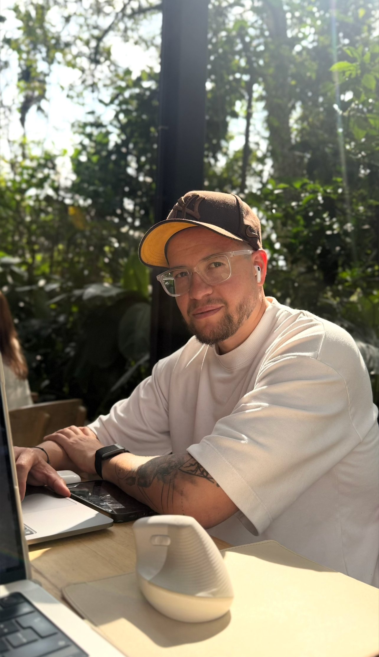 Daniel Rua working at a laptop in Medellín